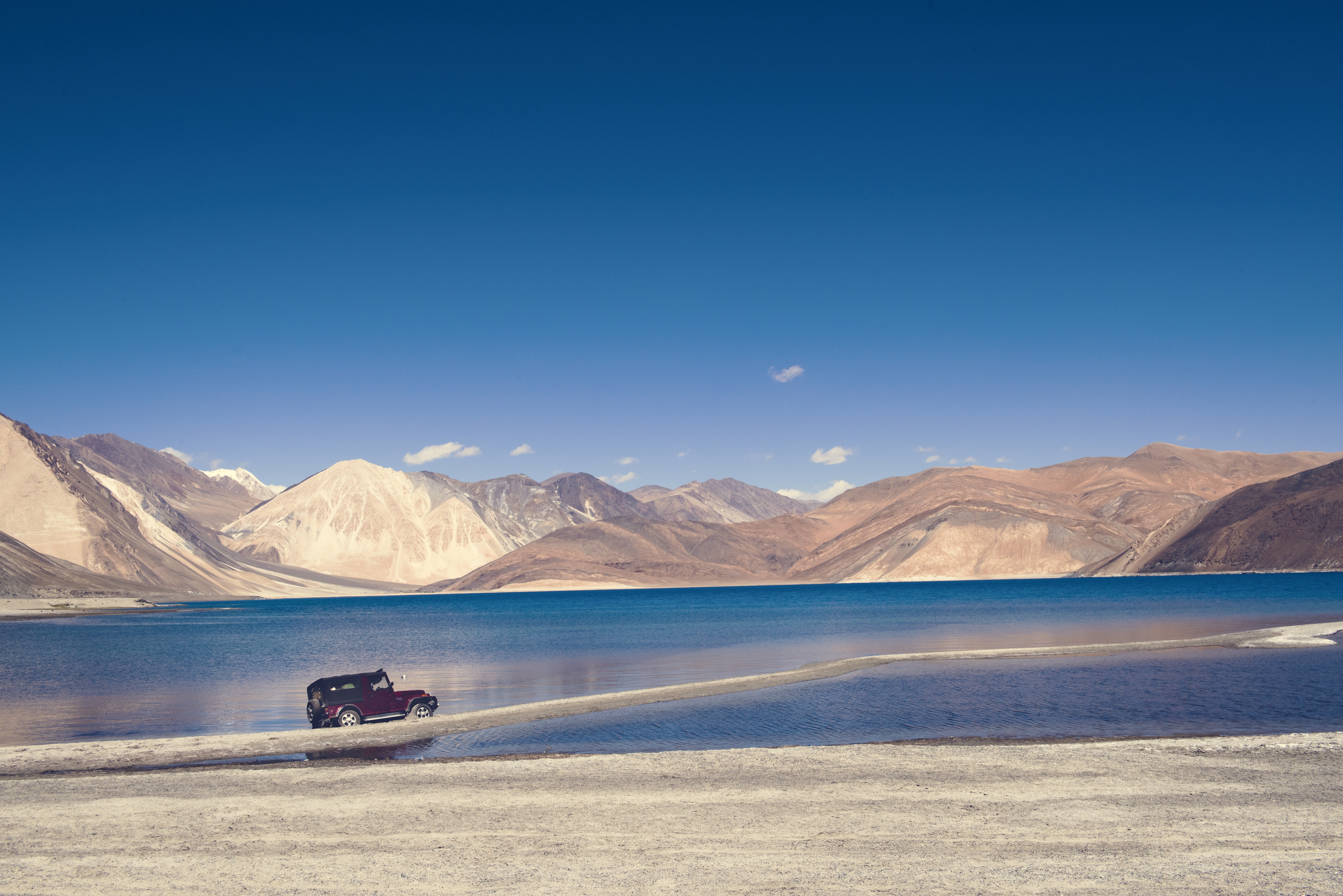 Turquoise lake surrounded by mountains near Skardu